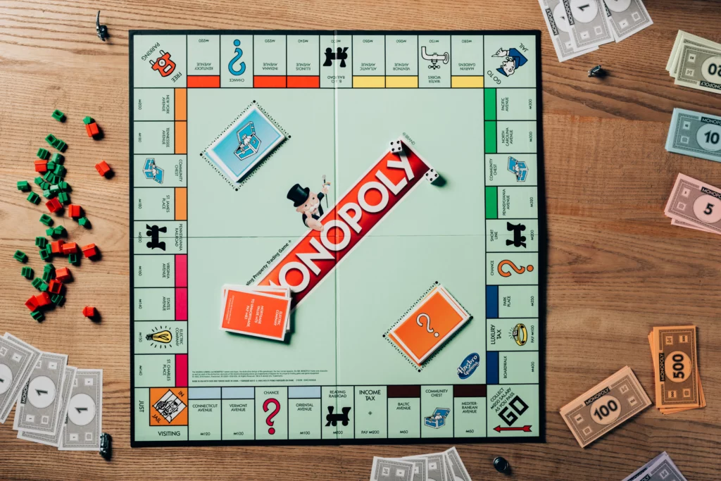 real estate agents playing Monopoly