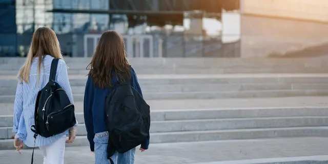 University Student Walking to Campus